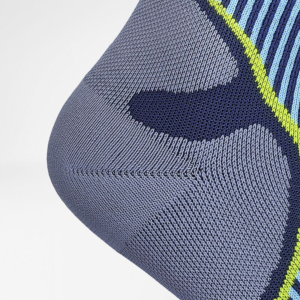 Vue détaillée de la zone de protection du talon des chaussettes de course mi-longues