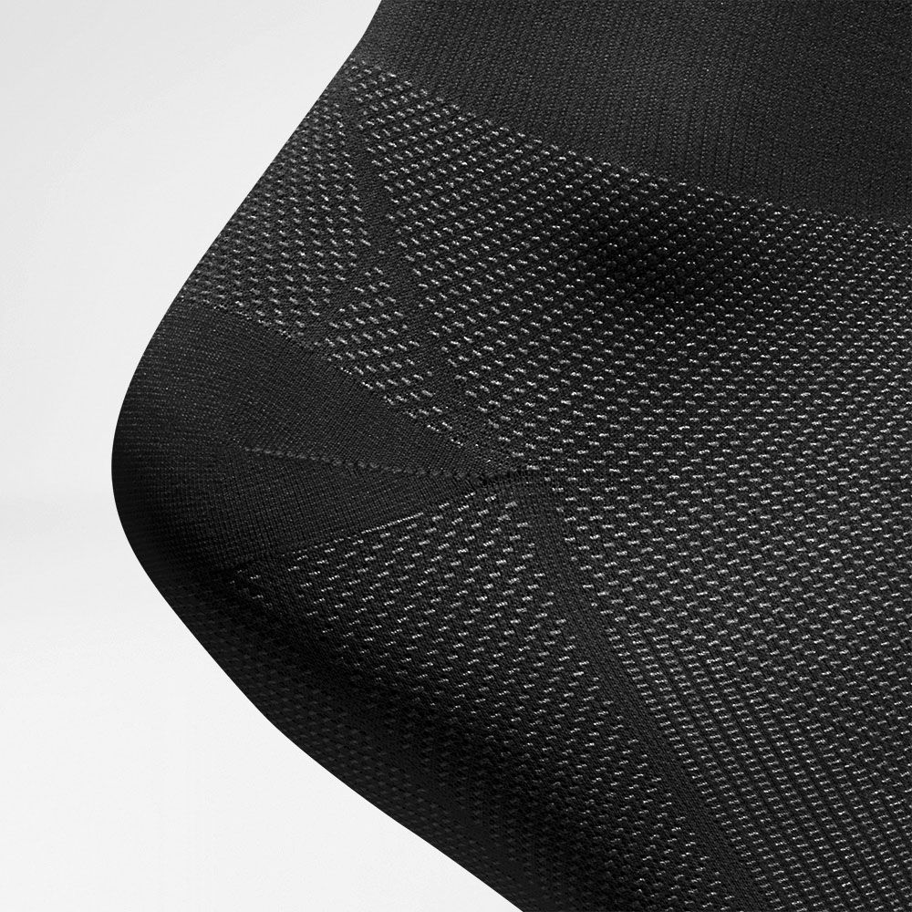 Chaussettes de compression régénération noir détail talon Vue détaillée de la section du talon des Sportstsockses pour la régénération