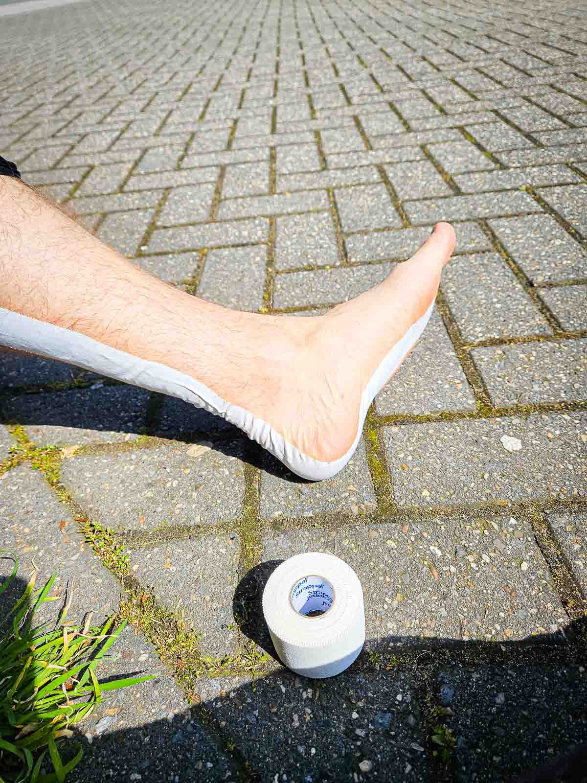 Cheville tapée Une cheville a été tapée avec un rouleau de tape