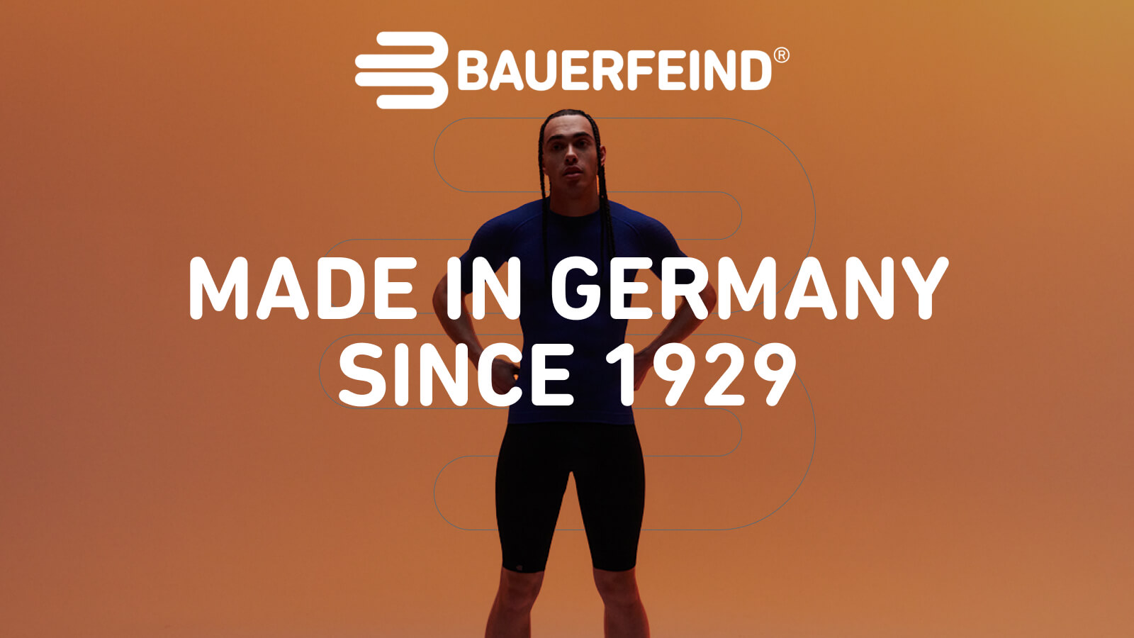 À propos de Bauerfeind Sports Dirk Nowitzki lors d'un lay-up en noir et blanc au-dessus du logo Bauerfeind et le texte "Made in Germany since 1929"