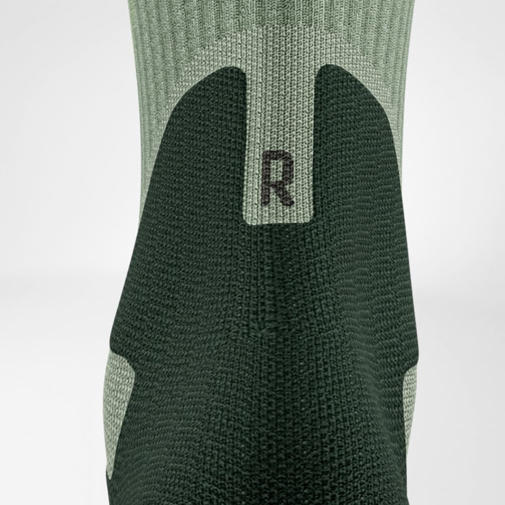 Merino-Wandersocken hellgrün Detail Achilles Comfort Detailansicht des Achillessehenbereiches der Merino-Wandersocken in hellgrün